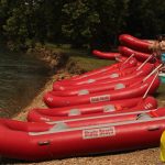 Kayaks and rafts along the Elk River at Shady Beach Campground in Noel, Missouri